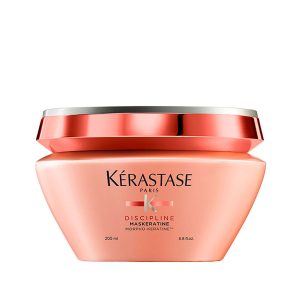 Kérastase Discipline Maskeratine hair mask jar in pink peach color with pink lid, 200 ml