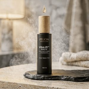 PĒLION VitaLift Body Oil 100ml σε κομψό μαύρο μπουκάλι.