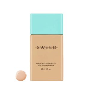 SWEED Glass Skin Foundation bottle with a turquoise cap and a dab of beige foundation beside it on a white background.