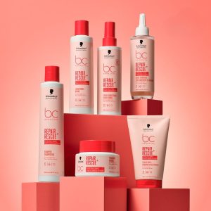 Schwarzkopf Professional Bonacure Repair Rescue+ Spray Conditioner 200ml σε ροζ φόντο.