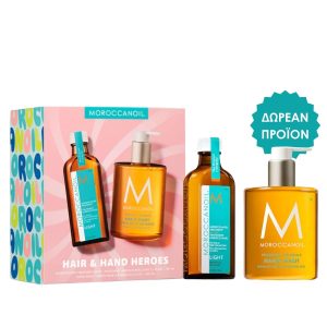 Moroccanoil Hair & Hand Heroes gift set with pink box and three amber bottles with turquoise labels, Greek 'free product' badge on the right